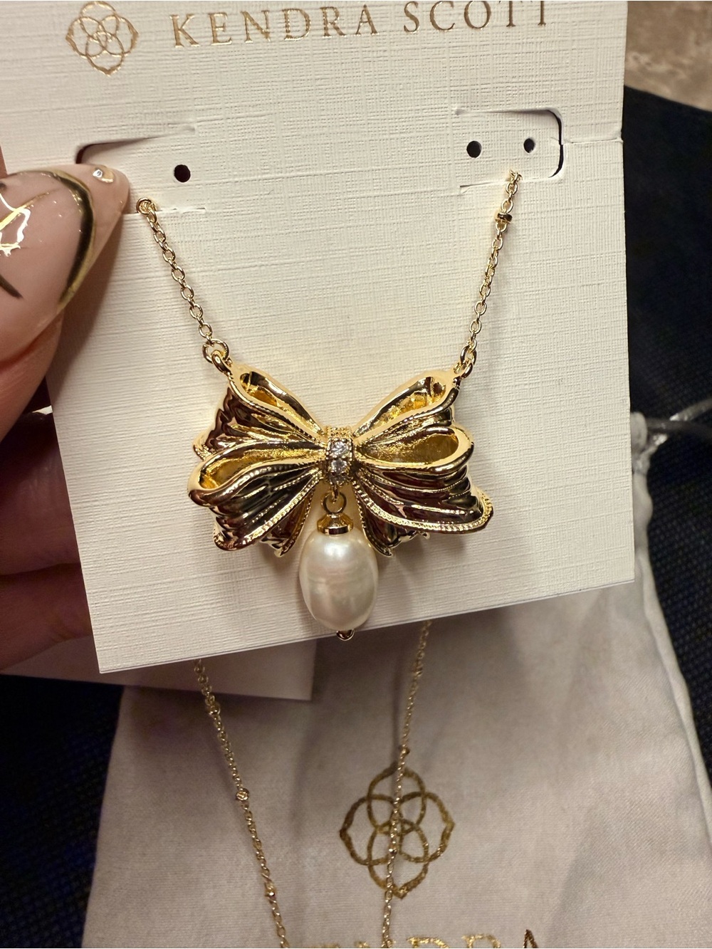 Kendra Scott x LoveShackFancy Pearl
Bow Gold Necklace & earrings set - Picture 3 of 8